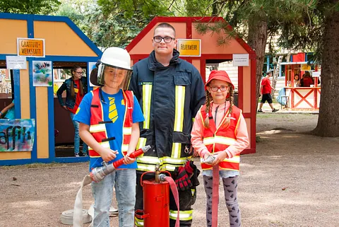 Mechanic installing brake caliper on rotor